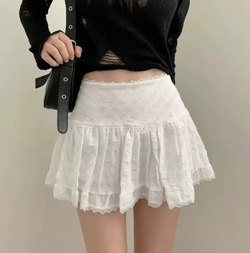 Model twirling in soft girl balletcore skirt
