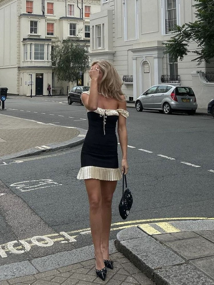 Close-up of pleated hem design and subtle lace stitching