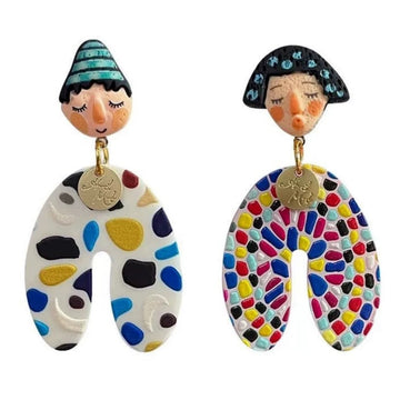 Bold asymmetrical earrings with colorful Indian cartoon faces, perfect for Y2K aesthetic streetwear and cultural style
