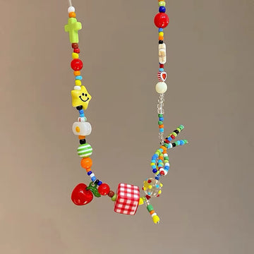 Y2K fruit bow colorful necklace featuring cute cartoon fruit charms, pastel beads, and star pendants for Harajuku, EMO, and egirl aesthetic outfits