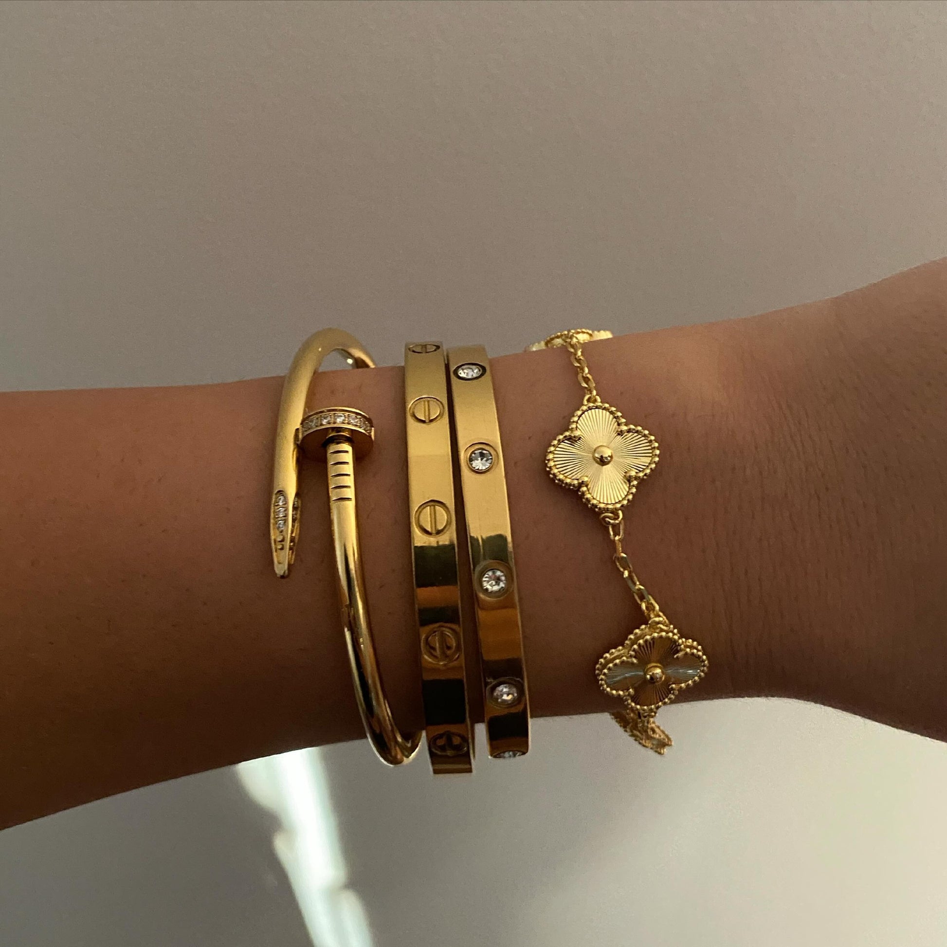 White Clover Bracelet shown with delicate shimmer, symbolizing luck and elegance for everyday wear.