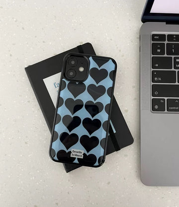 Close-up of the Korean Heart iPhone Case showcasing its glossy finish and heart design.