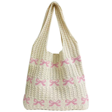 Front view of the Soft Girl Beach Bag showcasing the intricate knitted bow pattern.