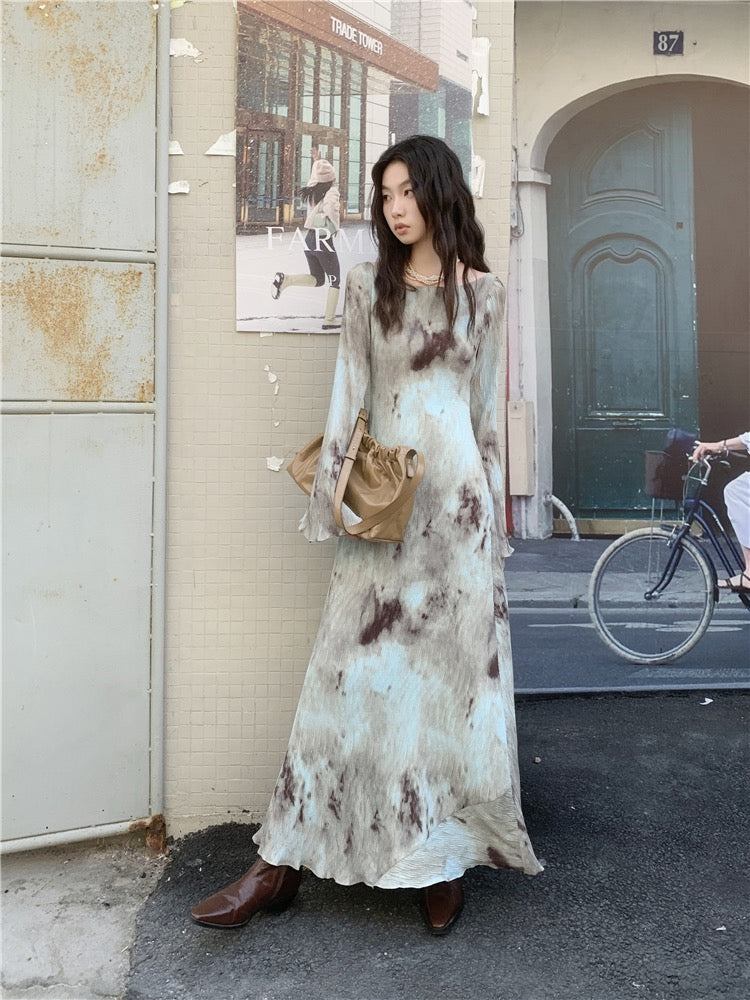 Tie dye flare maxi dress with long sleeves, displayed on a mannequin