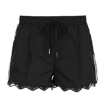 Black sporty Y2K shorts with side stripes and lace trim on the hem