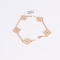 Four-leaf clover charm bracelet with clear crystals and gold finish