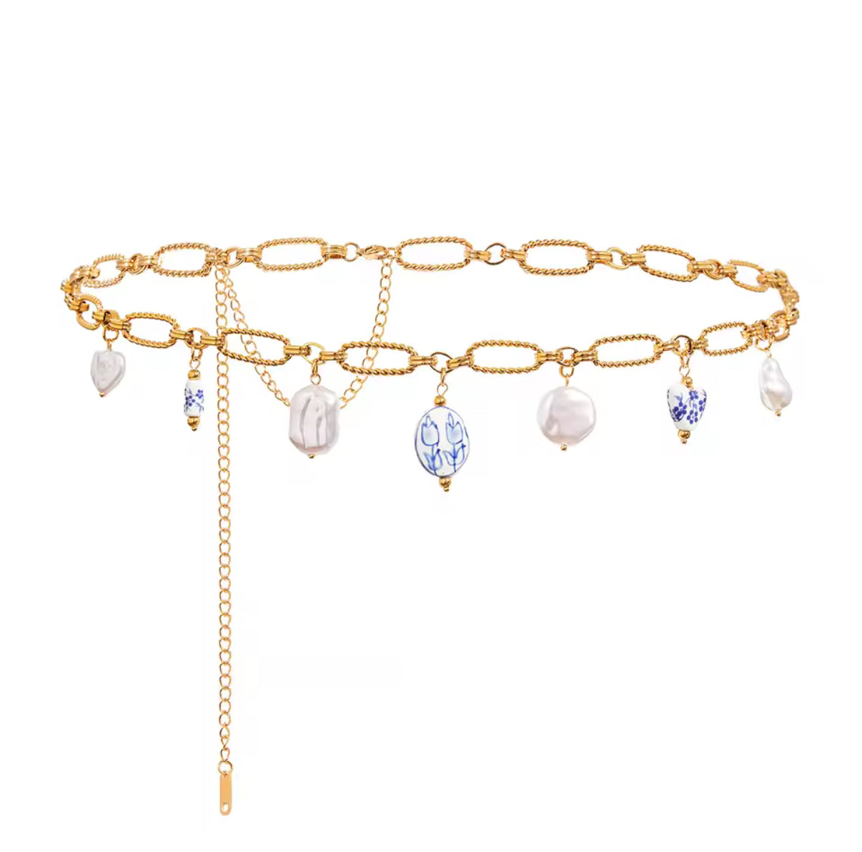 Gold waist chain styled with a bikini for vacation outfit inspiration.
