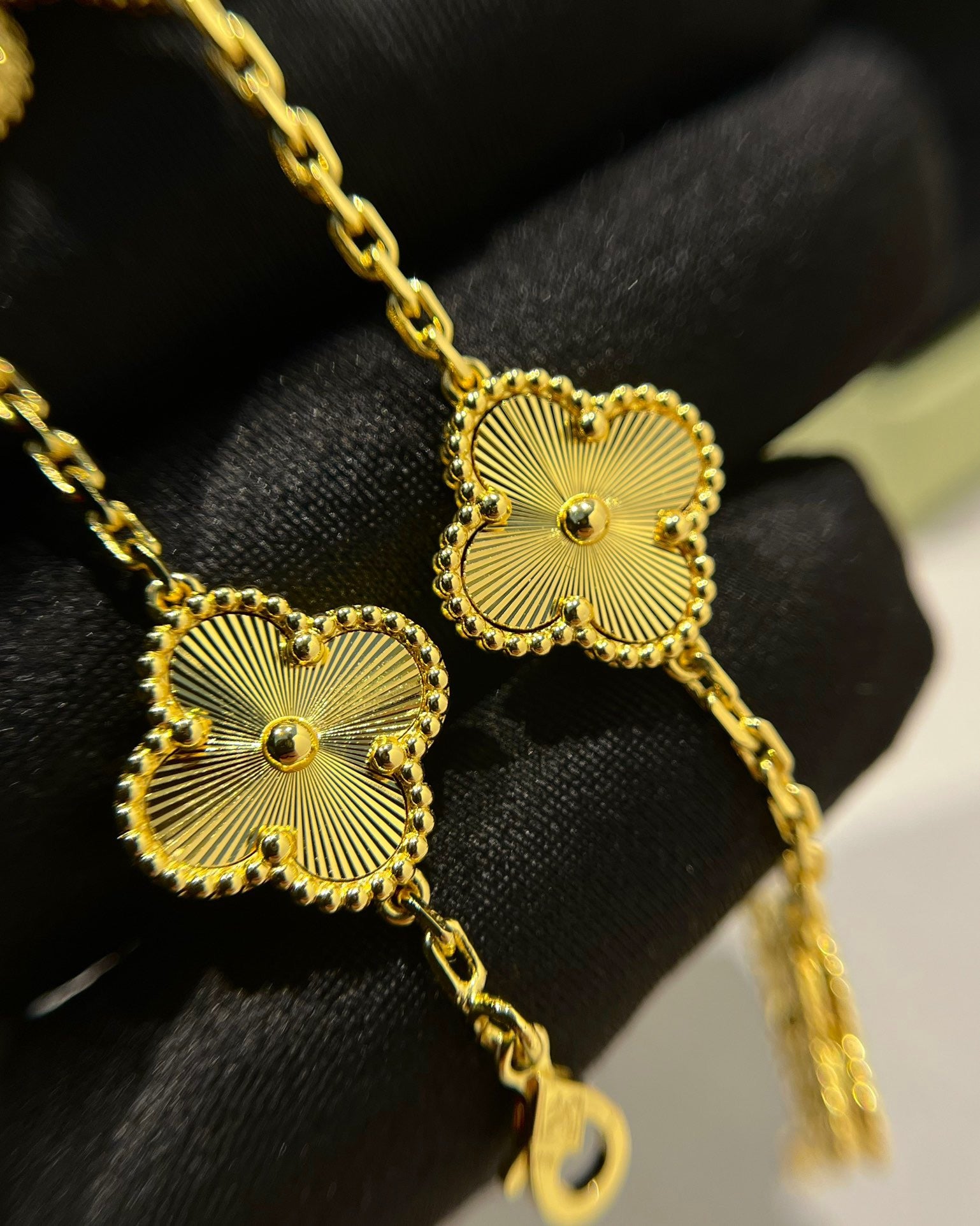 Four-leaf clover bracelet with minimalist laser-engraved detail