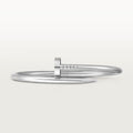 Designer white nail bangle with minimalist style and luxury finish