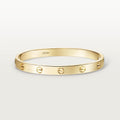 Gift-ready gold bracelet with love-inspired aesthetic