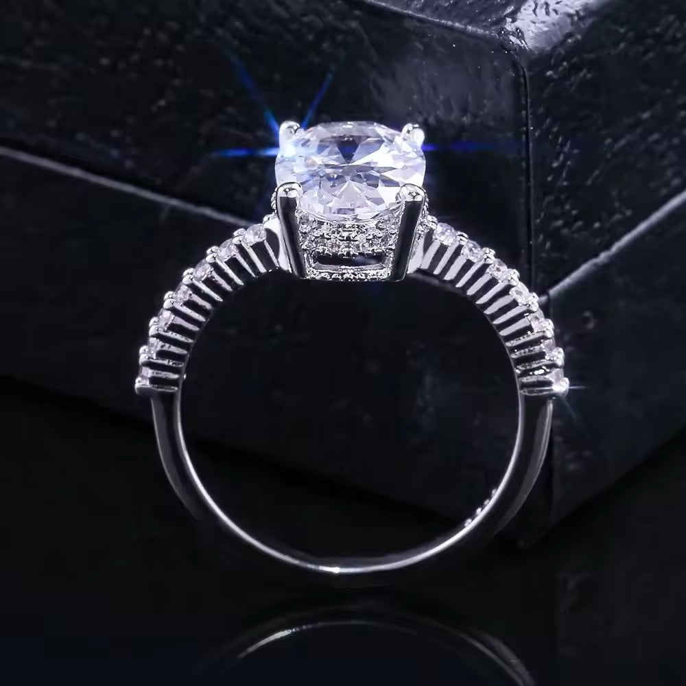 Oval-cut crystal ring with four-prong setting