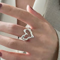 Adjustable open band silver ring with heart