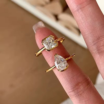 Minimalist silver ring with water drop gem