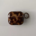 Elegant earphone case in amber brown swirl