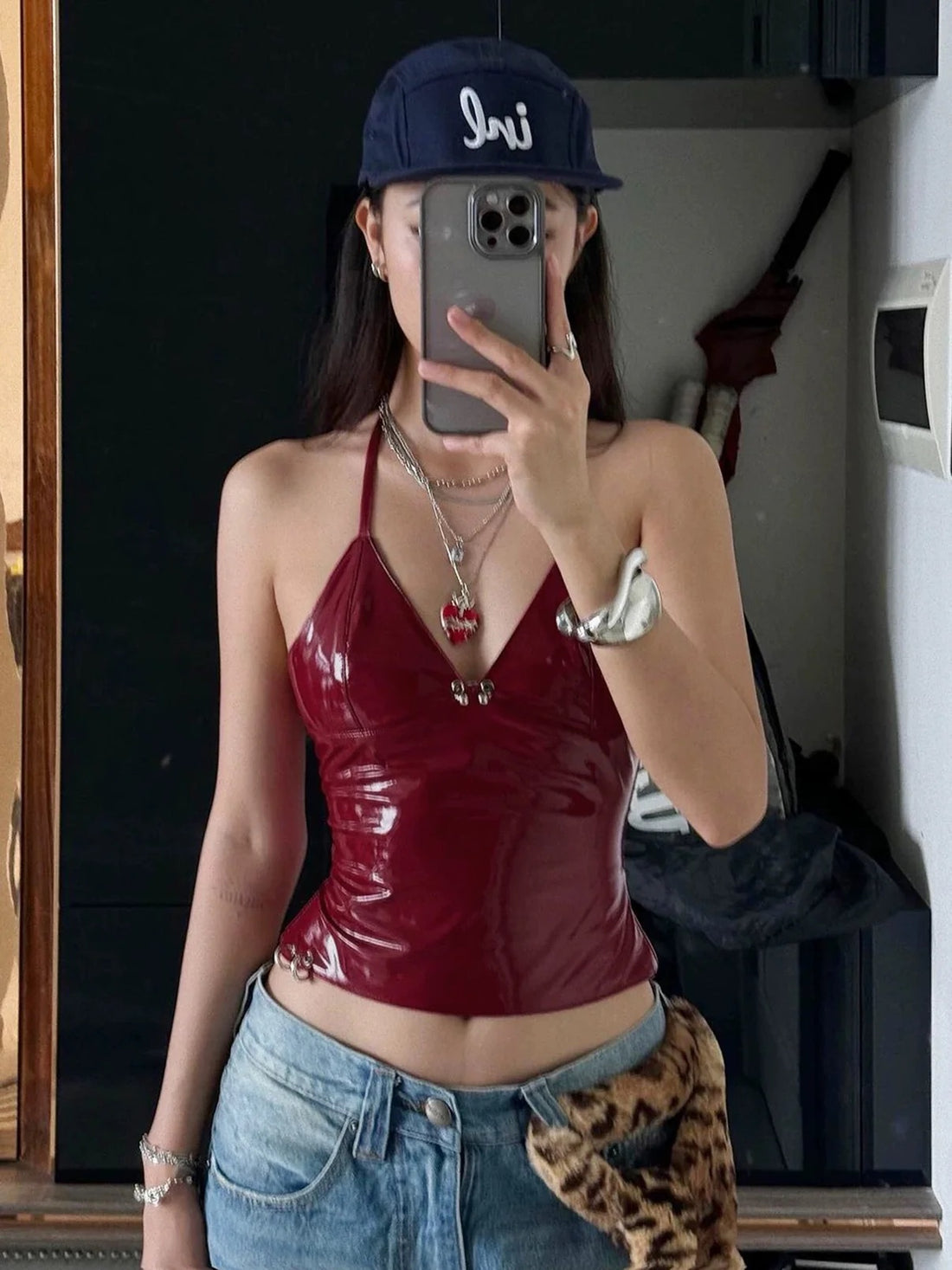 Y2K aesthetic leather halter top with backless lace-up design