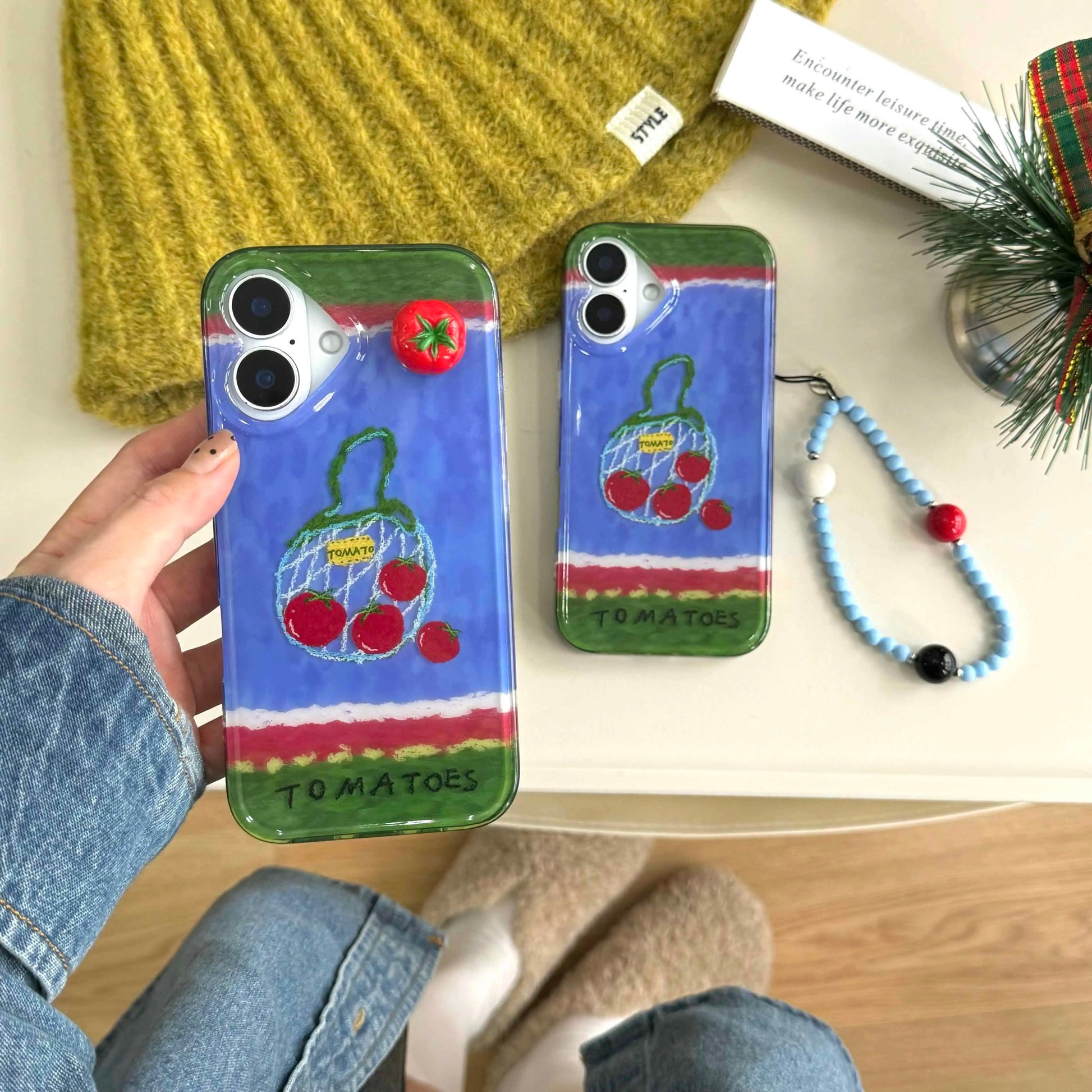 The Tomato Art iPhone Case alongside matching accessories for a coordinated look