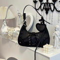 Fashionable mini bag with detachable strap and kawaii heart zipper, styled with cottagecore accessories