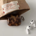Shockproof brown AirPods case with wireless charging