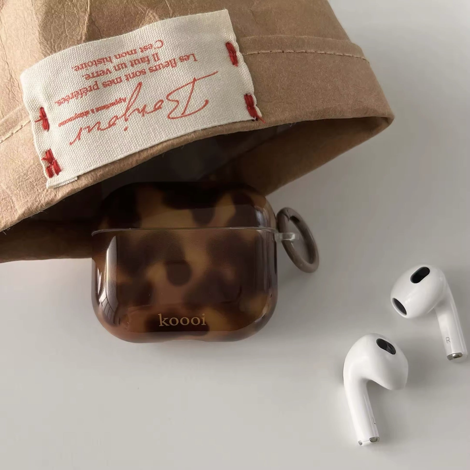 Shockproof brown AirPods case with wireless charging