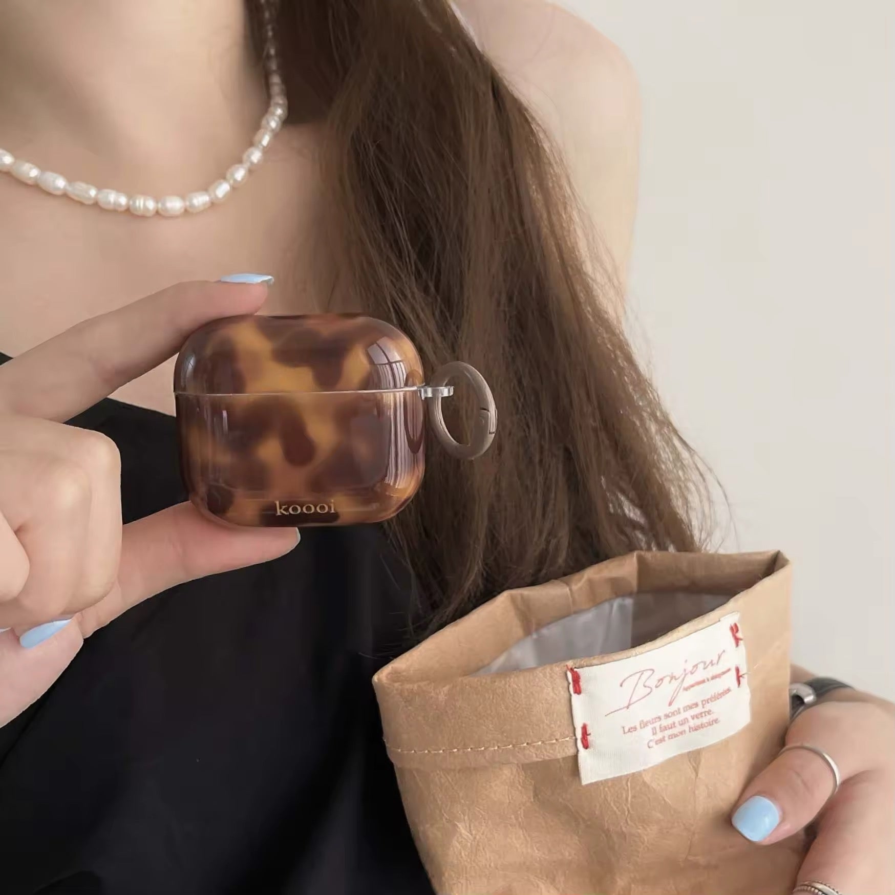 Glossy TPU AirPods Pro 2 case in amber swirl design