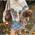 Warm button-up knit cardigan with cozy dog print, perfect for dog lovers and fans of cute, soft fall fashion knitwear