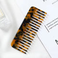 Colorful travel-friendly acetate hair comb for detangling