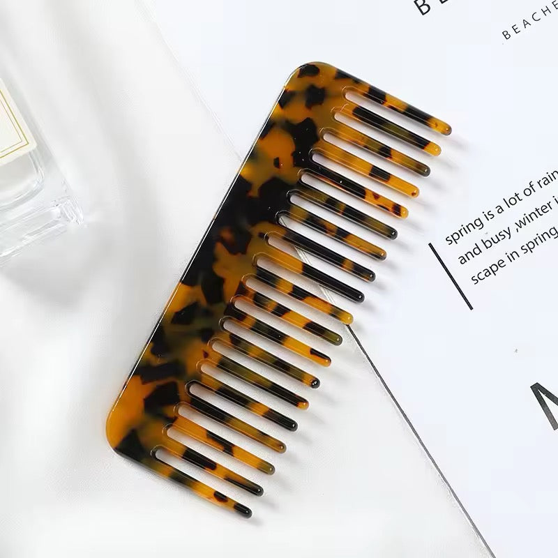 Colorful travel-friendly acetate hair comb for detangling