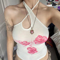 Asymmetrical floral halter top with Y2K aesthetic print
