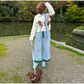 Vintage-inspired knit cardigan with dog print, soft and stylish buttoned outerwear for ladies with relaxed fit and charm
