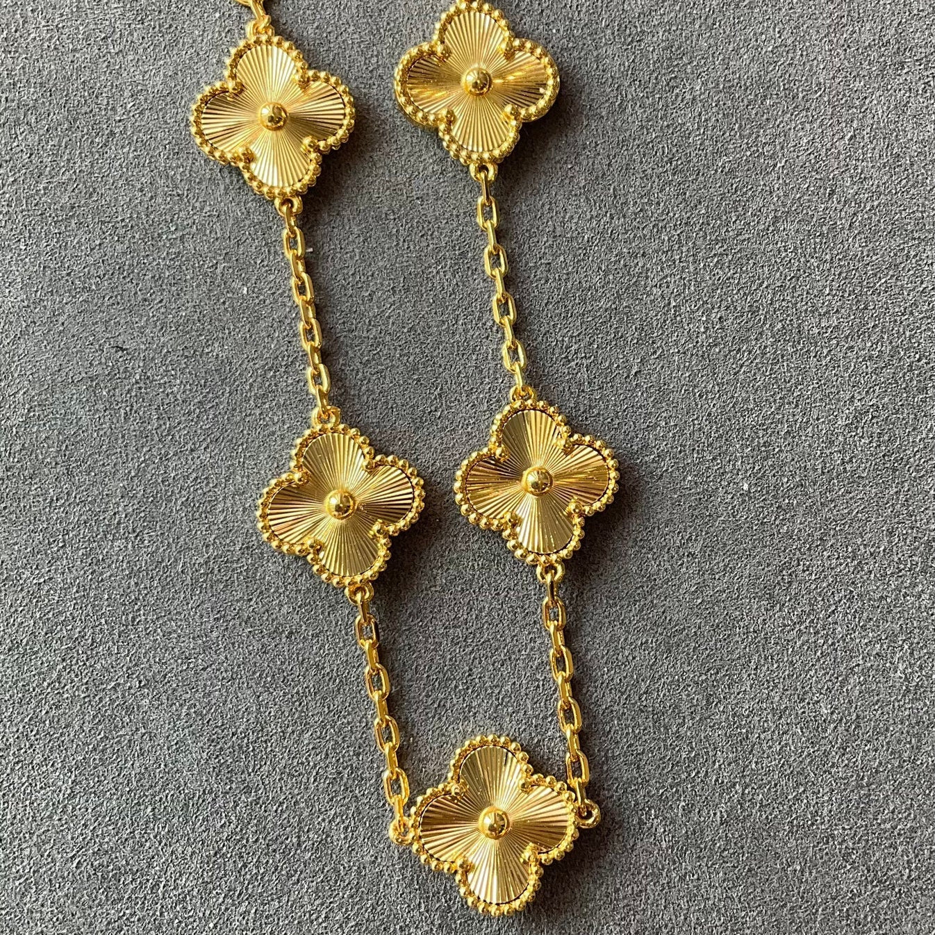 Delicate green clover bracelet with charm meaning