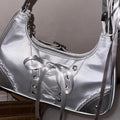 Trendy Y2K underarm bag with soft girl bow detail, styled in aesthetic pastel environment