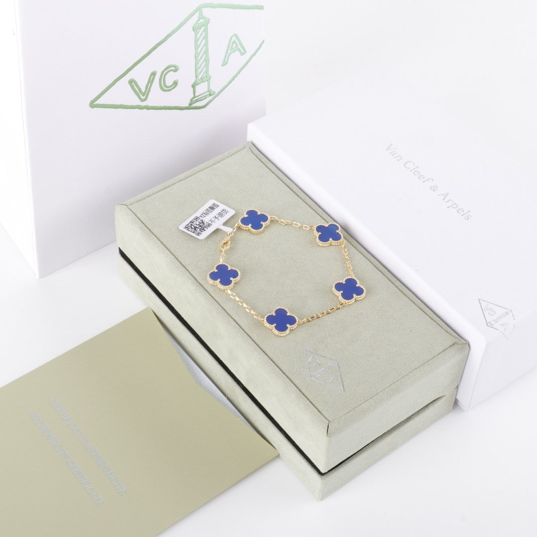 Blue clover bracelet with gold plating and soft enamel charm