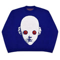 Blue knit sweater featuring a bold white face with red eyes on the front, ideal for Y2K alt fashion