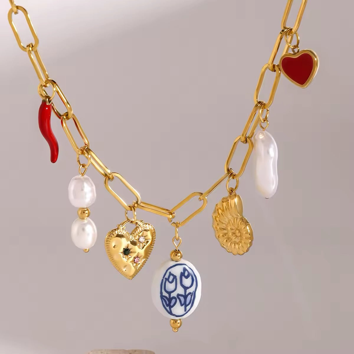 Minimalist gold-plated statement charm choker