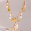 Trendy boho charm necklace with gold starfish and shell pendant