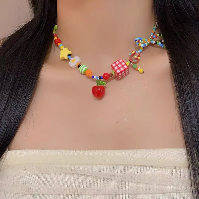 Sweet dopamine beaded necklace with colorful fruit charms and heart pendants, ideal for soft girl, coquette, or egirl Y2K fashion