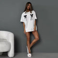 Comfy and trendy minimalist bow tee, Korean style T-shirt with cute bow print, ideal for soft girl aesthetic and everyday wear