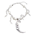 Y2K aesthetic pearl choker with a celestial moon and star pendant, luxury vintage-inspired jewelry for spiritual and mystical fashion lovers