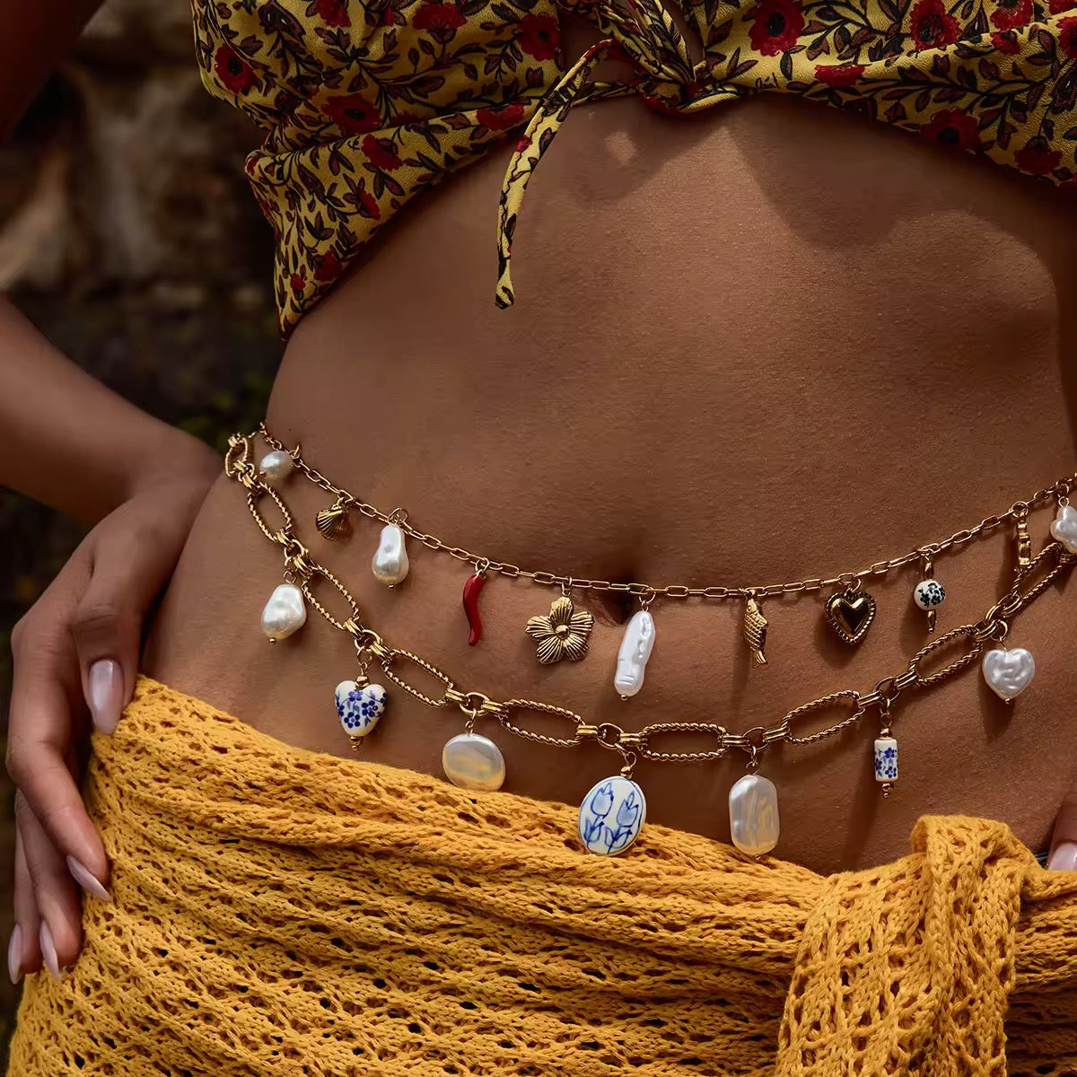 Adjustable boho belly chain styled flat against a neutral background.