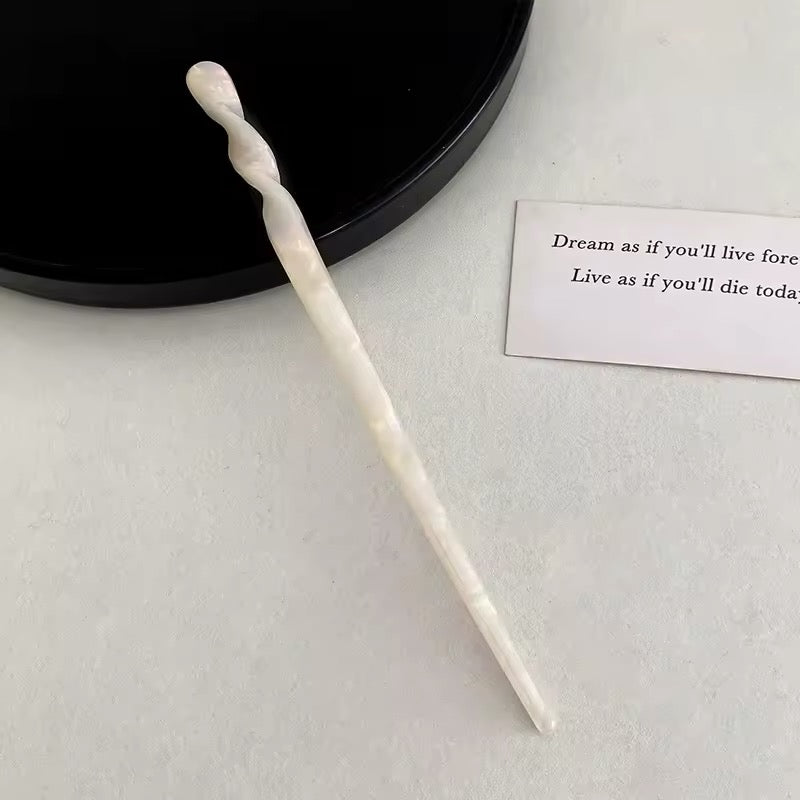 Minimalist acetate hairpin with a sleek, polished finish