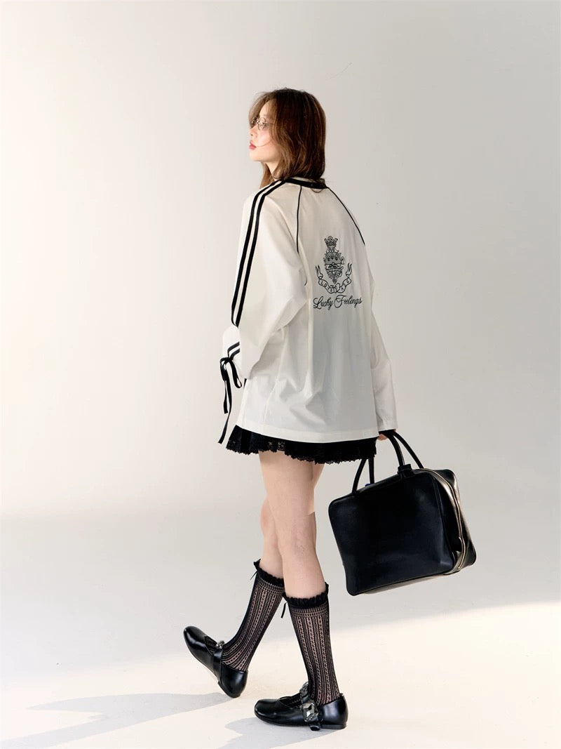 Trendy balletcore streetwear look with oversized jersey top and soft girl makeup.
