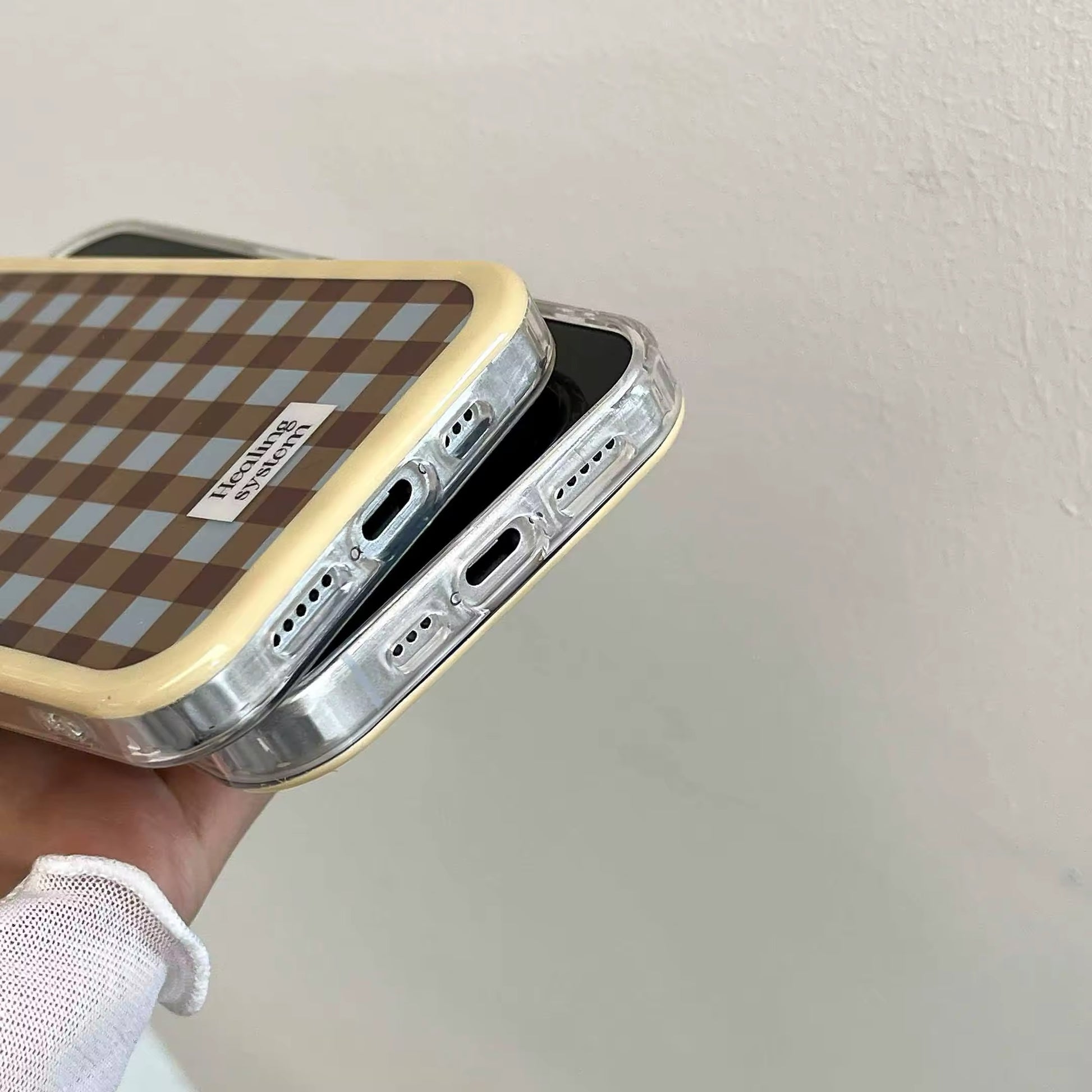 Back view displaying the classic brown checkered design on iPhone
