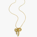 Chic and timeless gold bow necklace for everyday wear