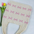 Side angle highlighting the spacious interior of the coquette crochet tote.