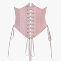 Close-up of lace-up detail on a vintage fairycore mini dress