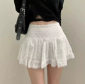 Close-up of lace ribbon trim on mini skirt