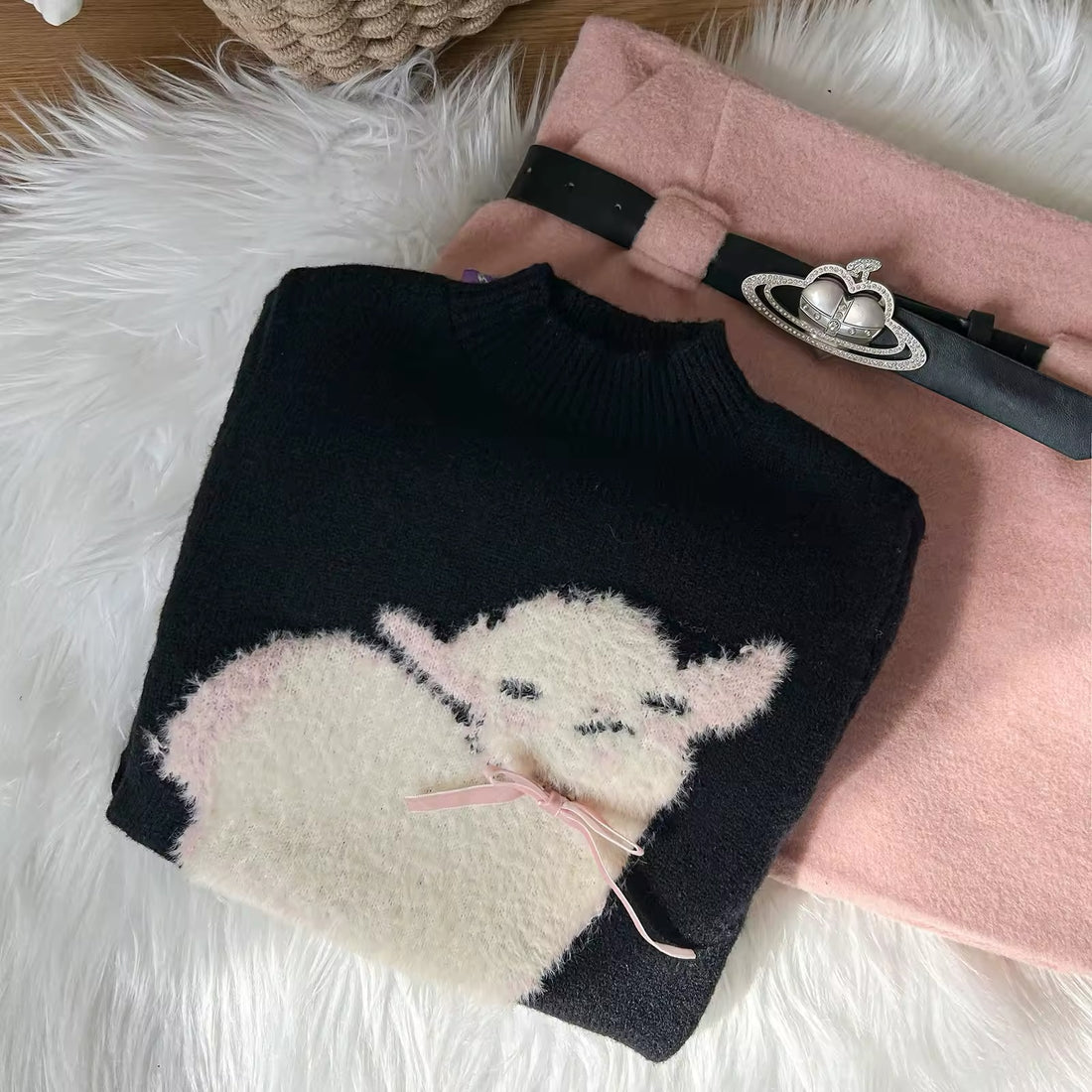 Model wearing sheep pullover in soft girl outfit