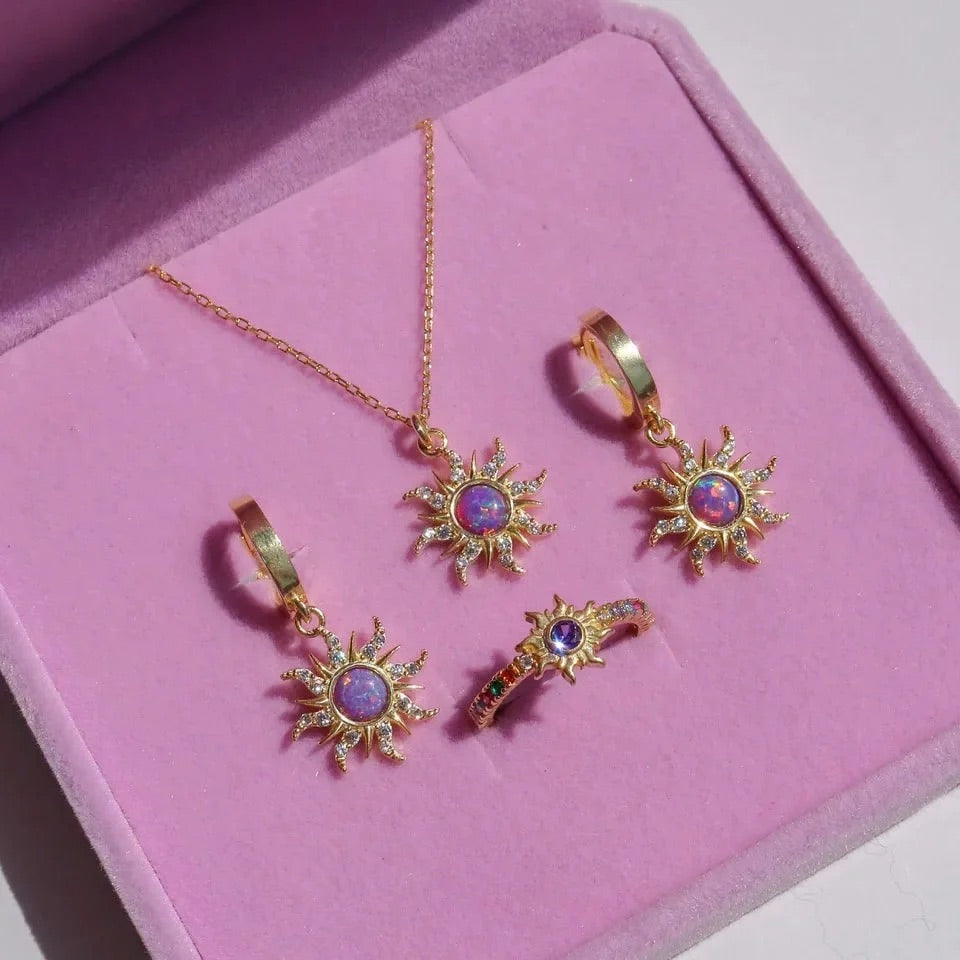 Coquette-style jewelry pieces laid on a dreamy velvet jewelry box.