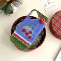 The case displayed on a rustic wooden table, complementing the cottagecore aesthetic