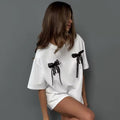 Sweet and simple bow print short-sleeved tee, round neck cotton shirt in loose fit, perfect for casual Y2K and Korean fashion outfits